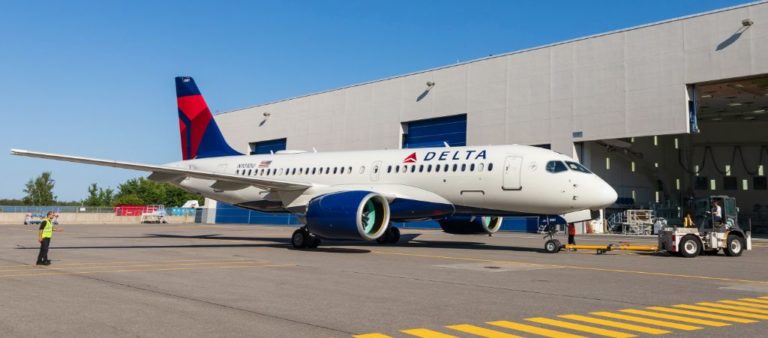 First Delta A220 rolls out of paintshop in Mirabel