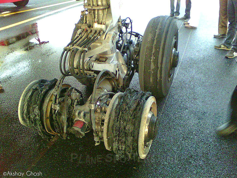Remains of landing gear after tyre burst and fire